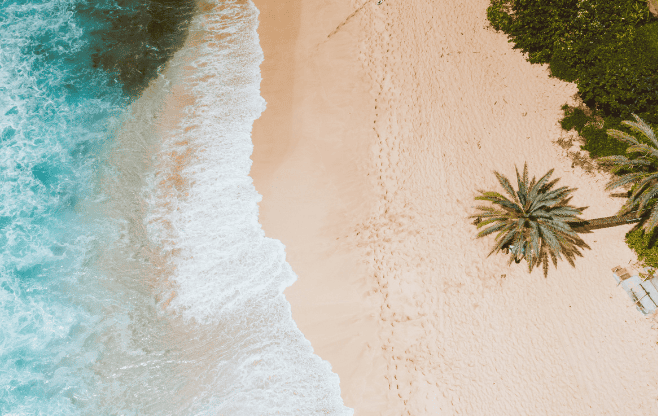 sand and ocean from aerial