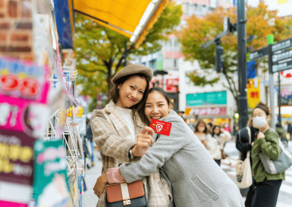 Ladies with card in japan street