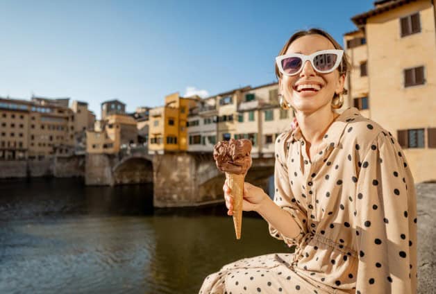 Woman in italy smiling with ice cream