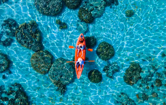 People in Kayak at sea